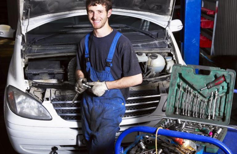 Mechanic posing with his tool box