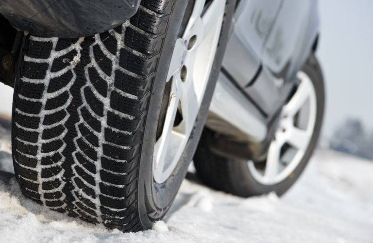 Winter tires on snowy road